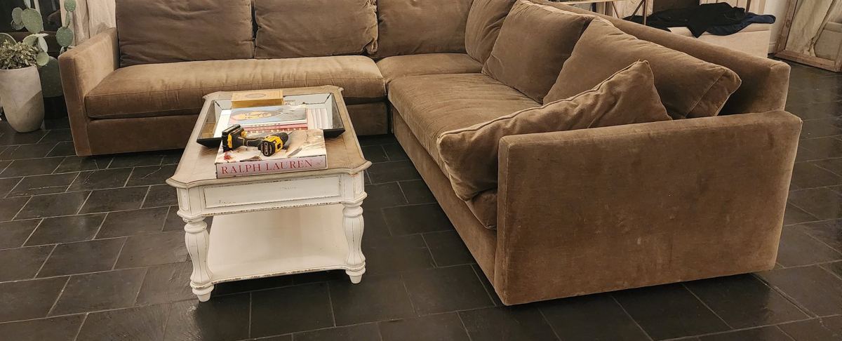 A sectional sofa rebuilt and placed in a living room